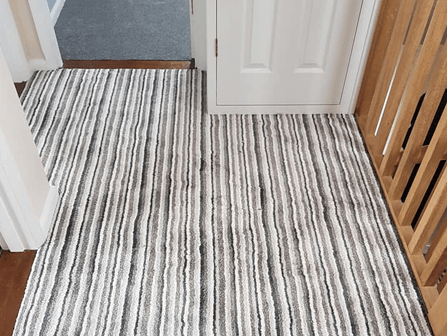 Striped carpet installed by carpet fitters colchester